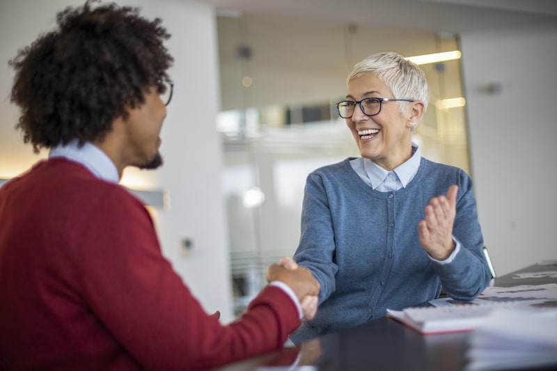 Collegues greeting at interview